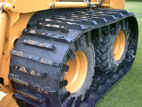 grouser tracks for skid steer|skid loader tracks over tires.